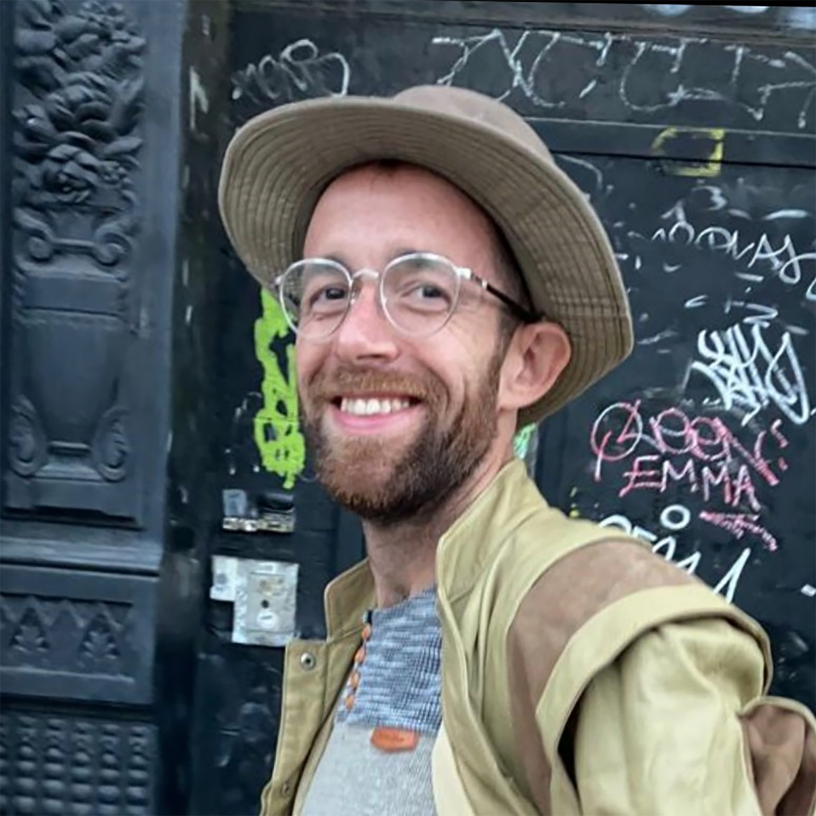 headshot of man smiling