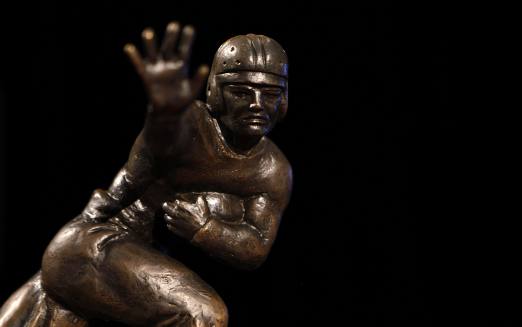 Photography of trophy sculpted in the form of a man playing football