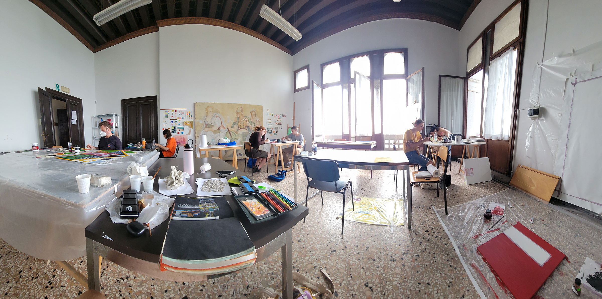 Pratt in Venice students at work in the painting studio at the Università Internazionale dell’Arte, where the Painting in Venice class takes place, taught by Michael Brennan, adjunct associate professor-CCE of fine arts (photos by Amy Ungricht)