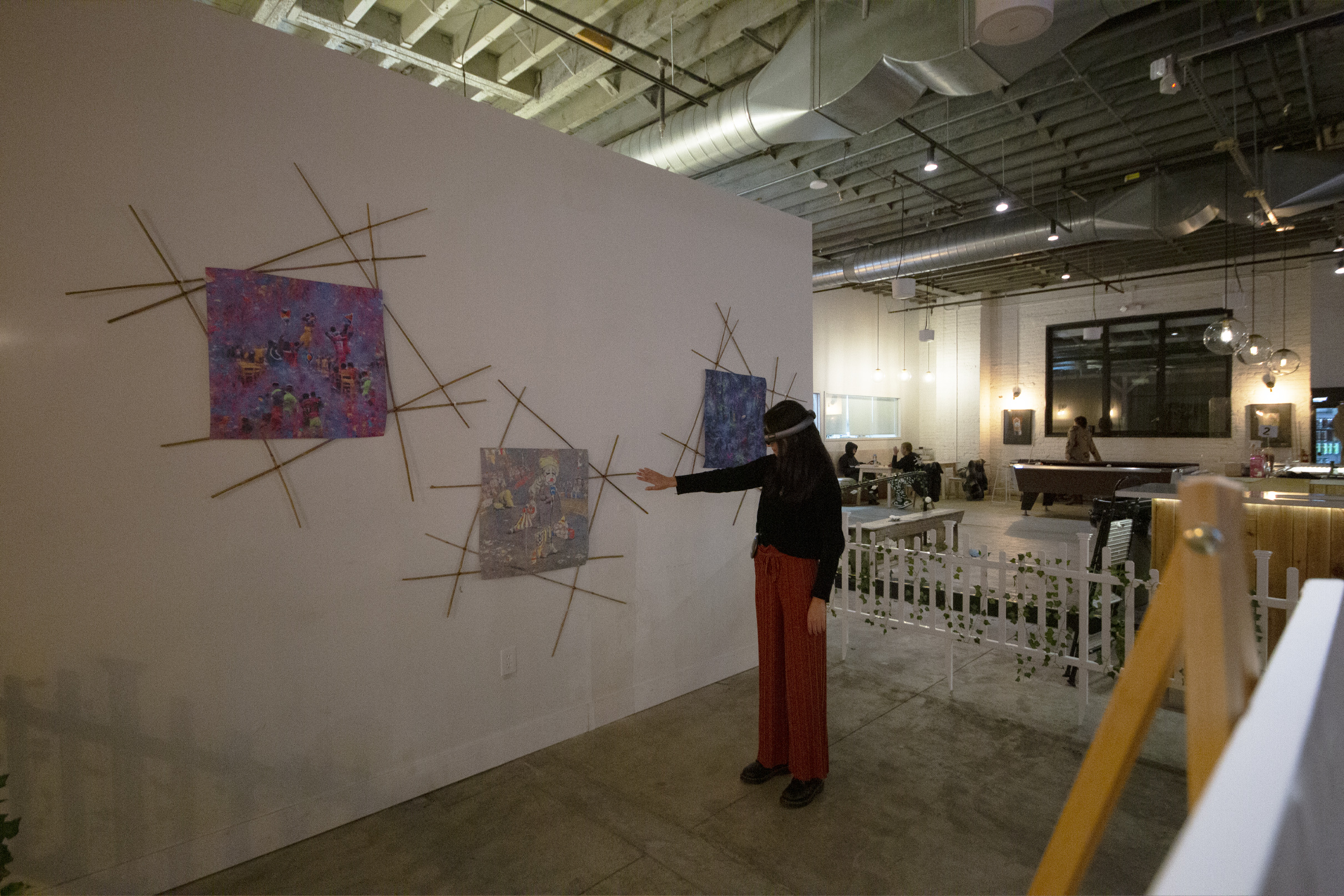 visitor wears an augmented reality headset.