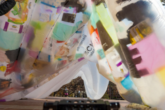 view from underneath the inflated structure, showing the patchwork of plastic film from retail and grocery bags.