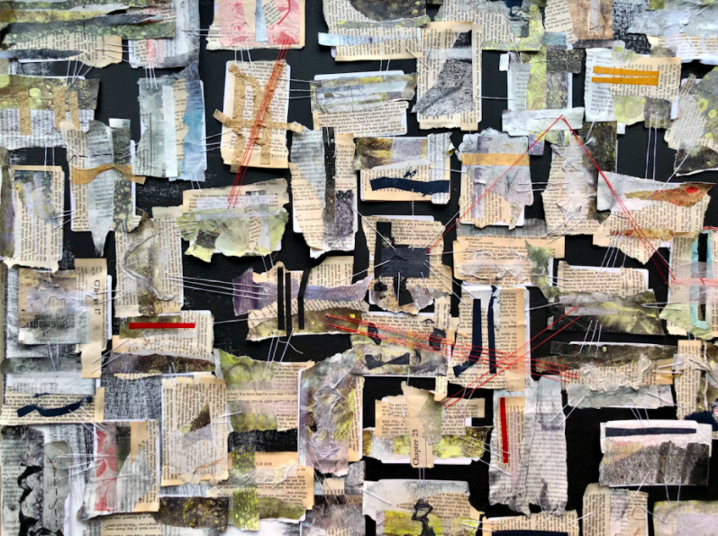 researcher's artwork is a collage of text and painting clips connected with string.
