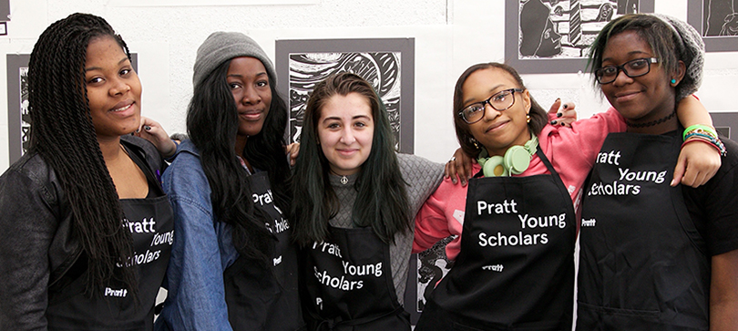 A group of diverse students in the Pratt Young Scholar program pose for a group pictures.