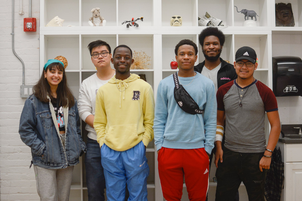 A diverse group of Young Scholars program participants pose for a group picture.