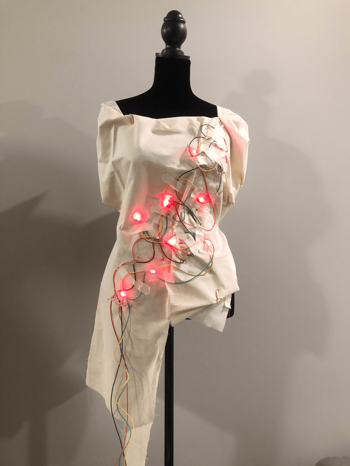 garment is lit up with red lights