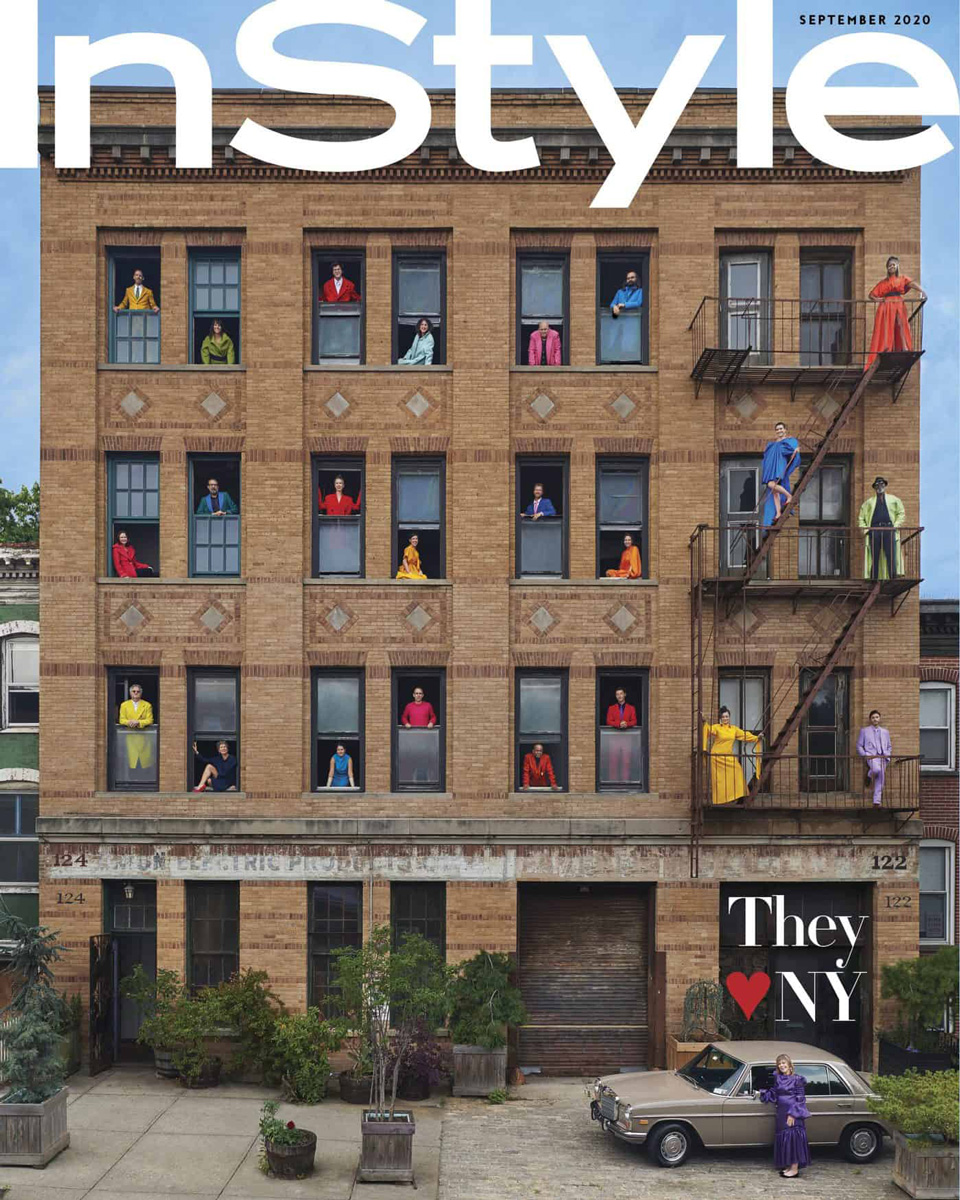Cover of InStyle magazine with a photo of colorfully dressed artists in the windows of a Brooklyn building