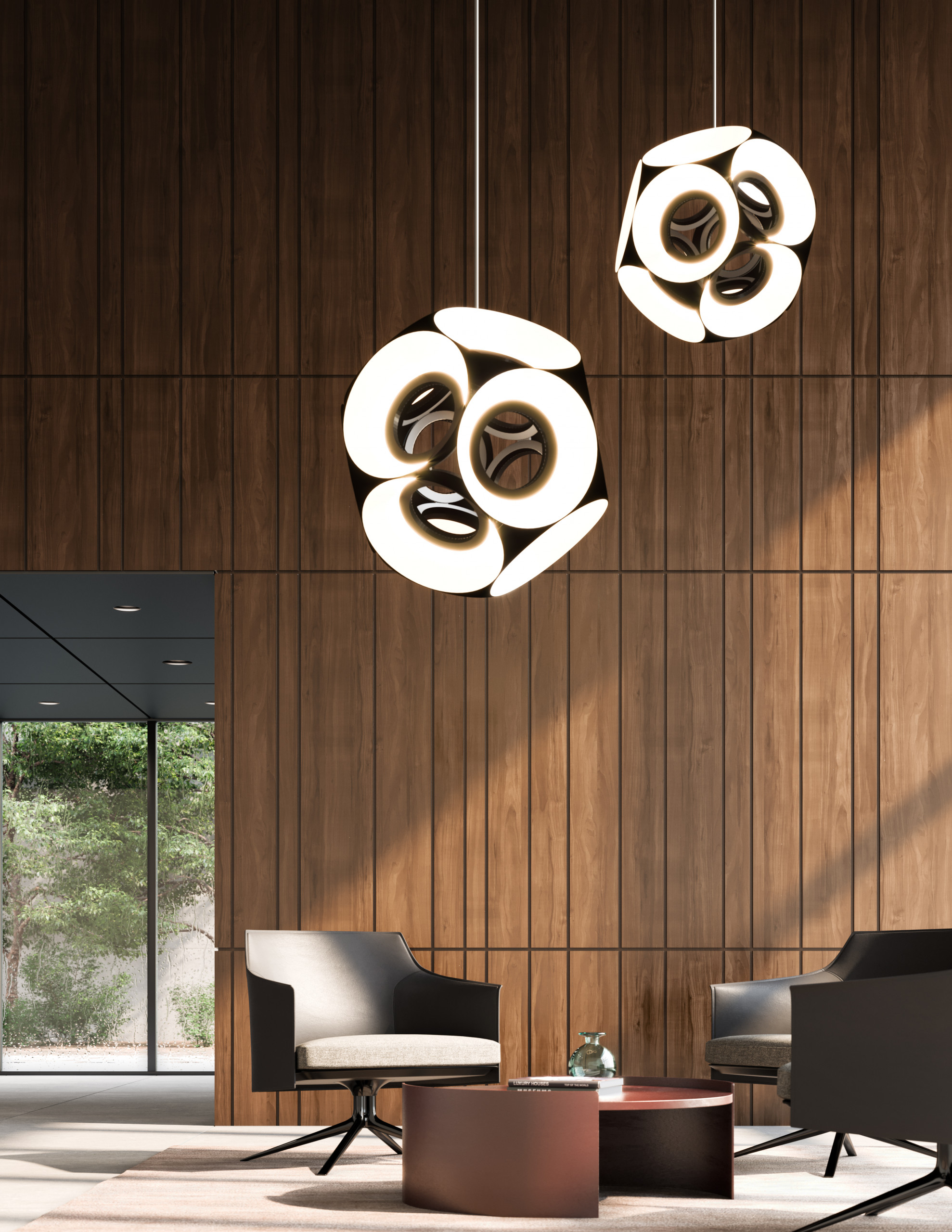 Pendant lamps of clustered illuminated circles hang above an arrangement of modern armchairs around a low table