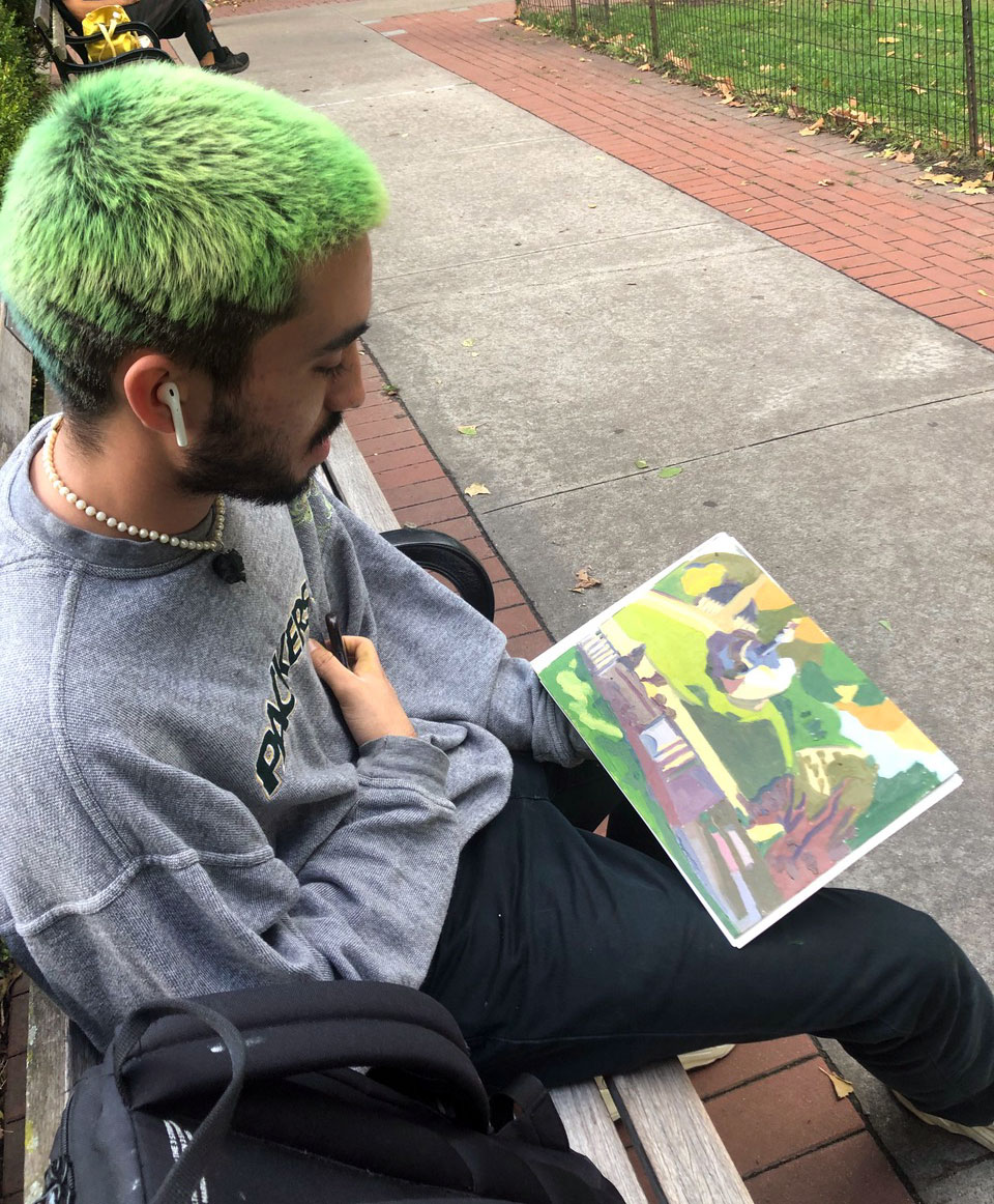 A person looking at a painting