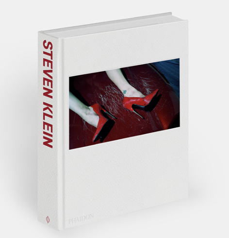 A Steven Klien book with the cover image of a persons legs in red stilettos
