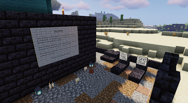 Base of digitally rendered statue with didactic, candles, and two placards with QR codes