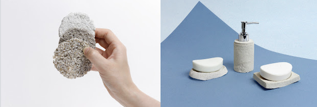 Hand holding three disks with visible ground seashells and cast prototypes of shell-colored soap dishes and dispenser