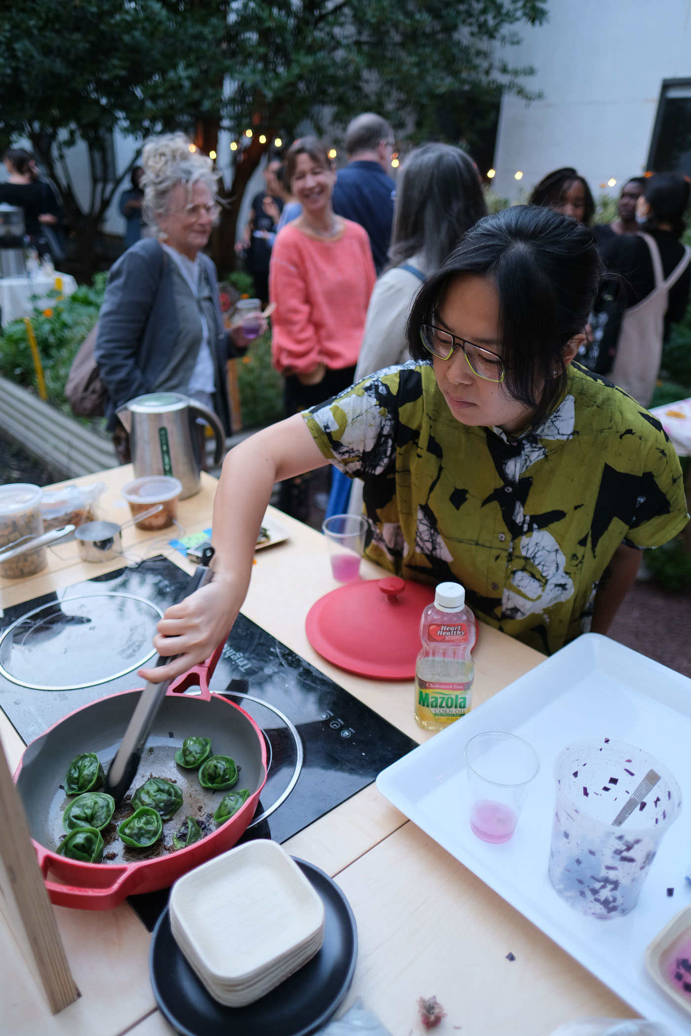 Making Diasporic Dumplings (red cabbage, shiitake, Hopi sunflower seeds, mizuna, and beet greens) at the Social Practice Kitchen at the Harvest Salon held this fall in the Pratt Dye Garden (courtesy Amanda Huynh)