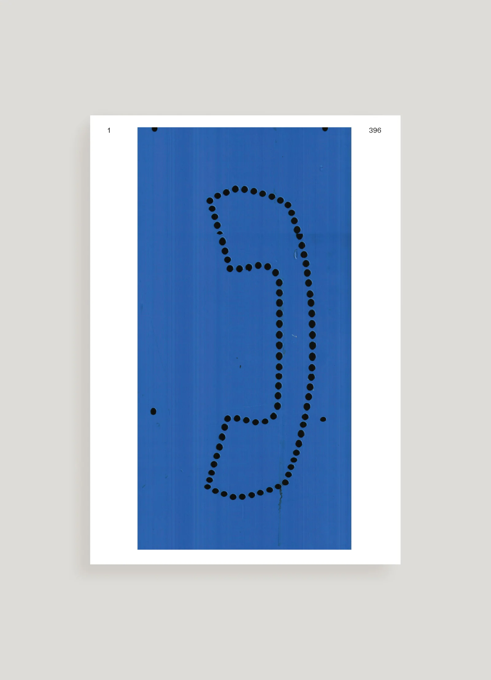 Book with detail of blue-colored phone booth showing phone icon