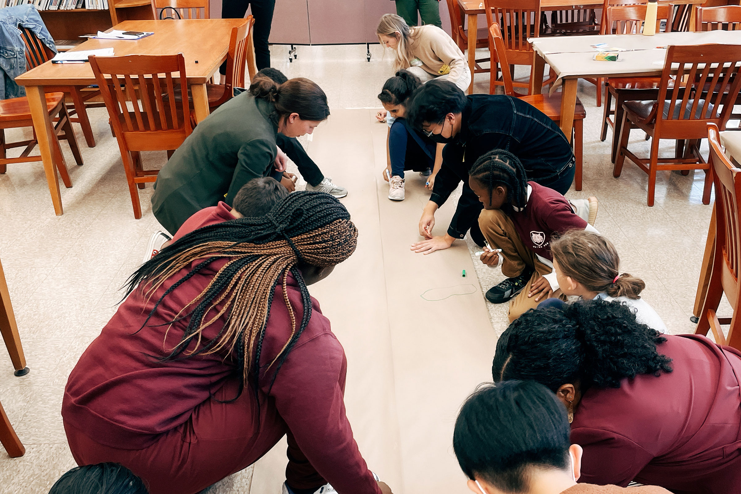 Drawing ideas for outdoor learning spaces in a visioning session at PS 206 in East Harlem