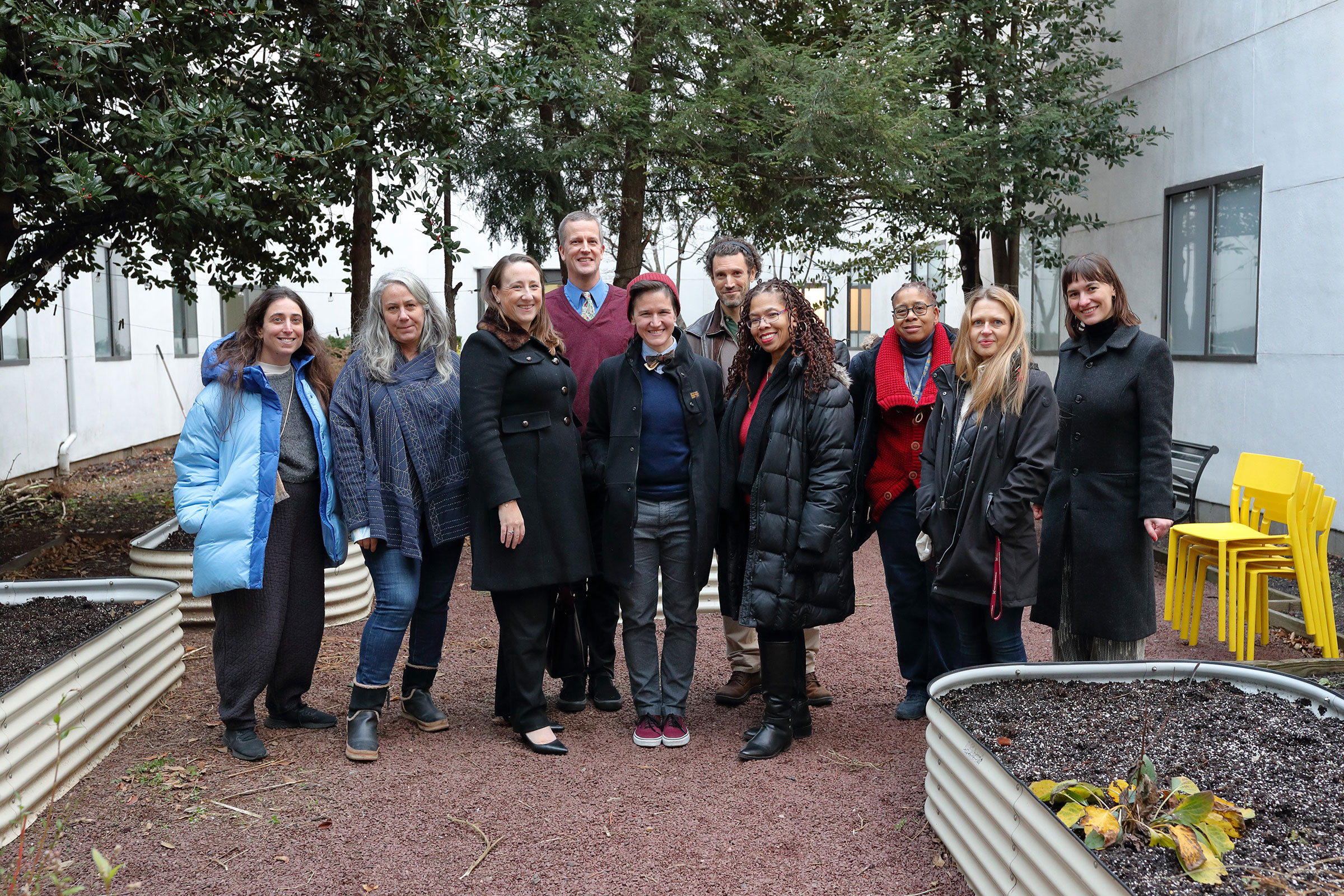 Some of the collaborators on “Weaving Threads: Natural Dyes at the Intersection of Art & Science,” from L to R: Isa Santos Rodrigues, visiting assistant professor of fashion design; Gina Gregorio, adjunct associate professor of fashion design; Meghan Dunn, District 13 superintendent; Christopher Jensen, associate professor of math and science; Pietrina "Pia" Micoli of PS270; Daniel Wright, director of STEAMplant; Desmond Rudder, PS 270 4th grade teacher; Nikki Shuler, PS 270 4th grade teacher; Cindie Kehlet, acting chair of math and science; Ana Codorean, MA Art and Design Education ’22 (photo by Ron Hester Photography)
