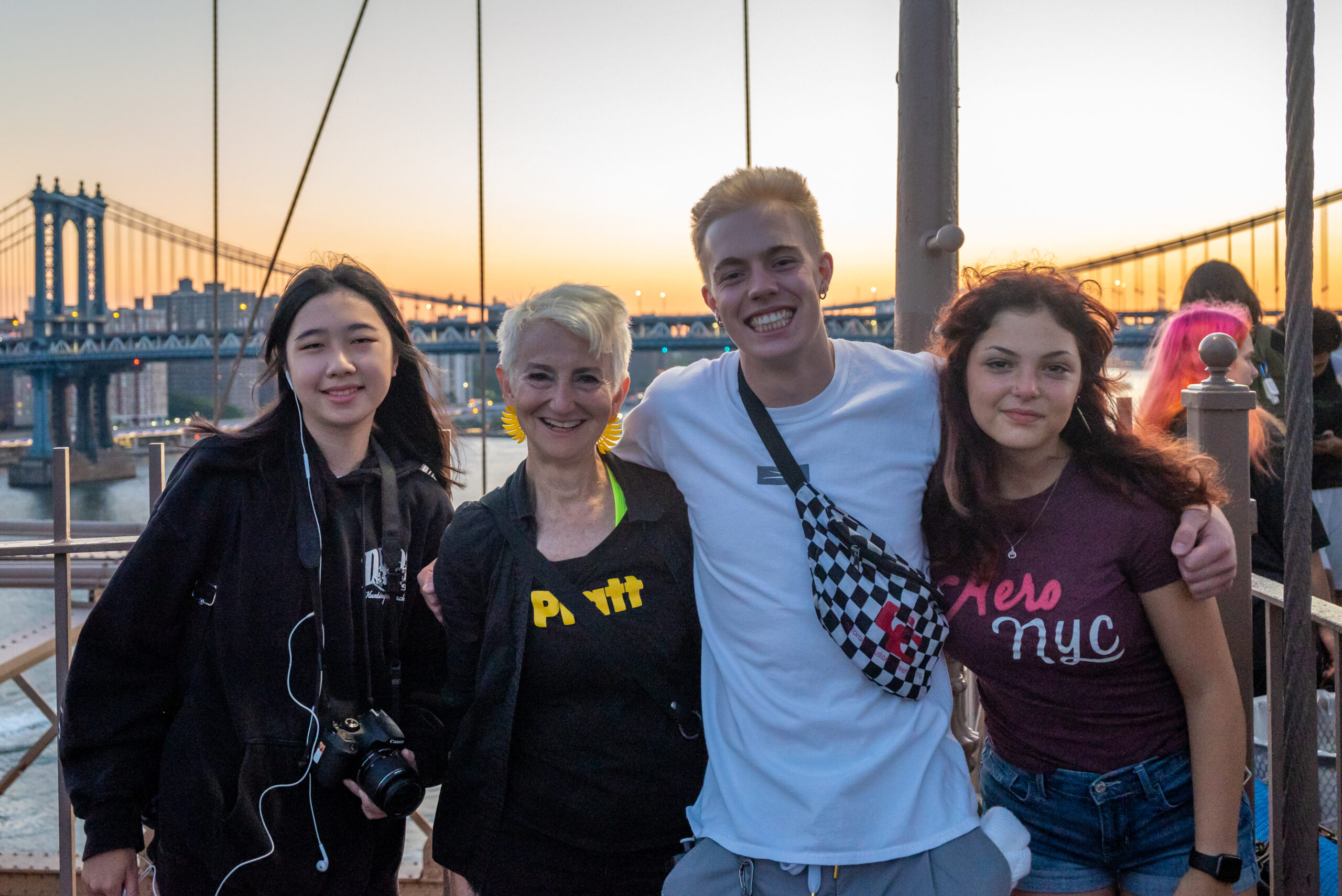 Students with Pratt President Frances Bronet, on Brooklyn Bridge