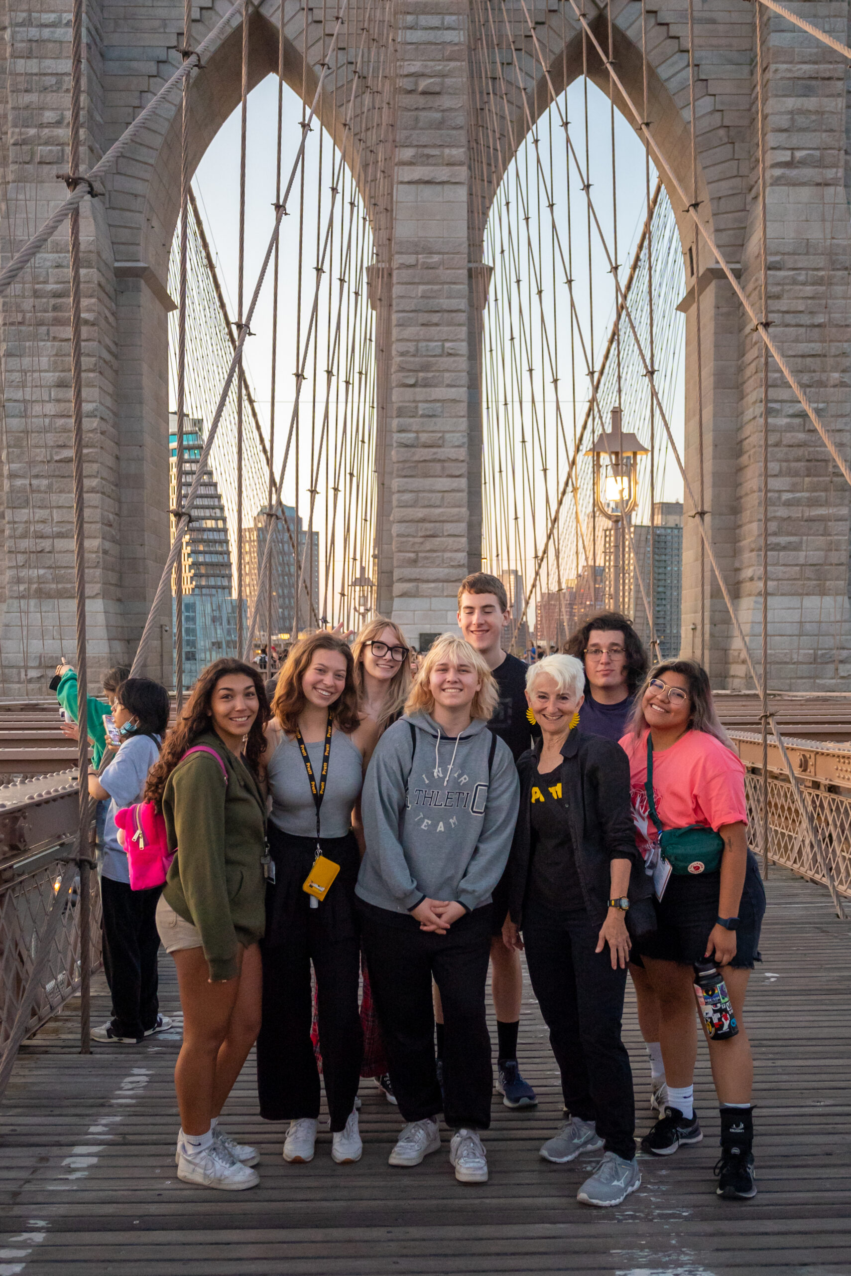 Students with Pratt President Frances Bronet, on Brooklyn Bridge