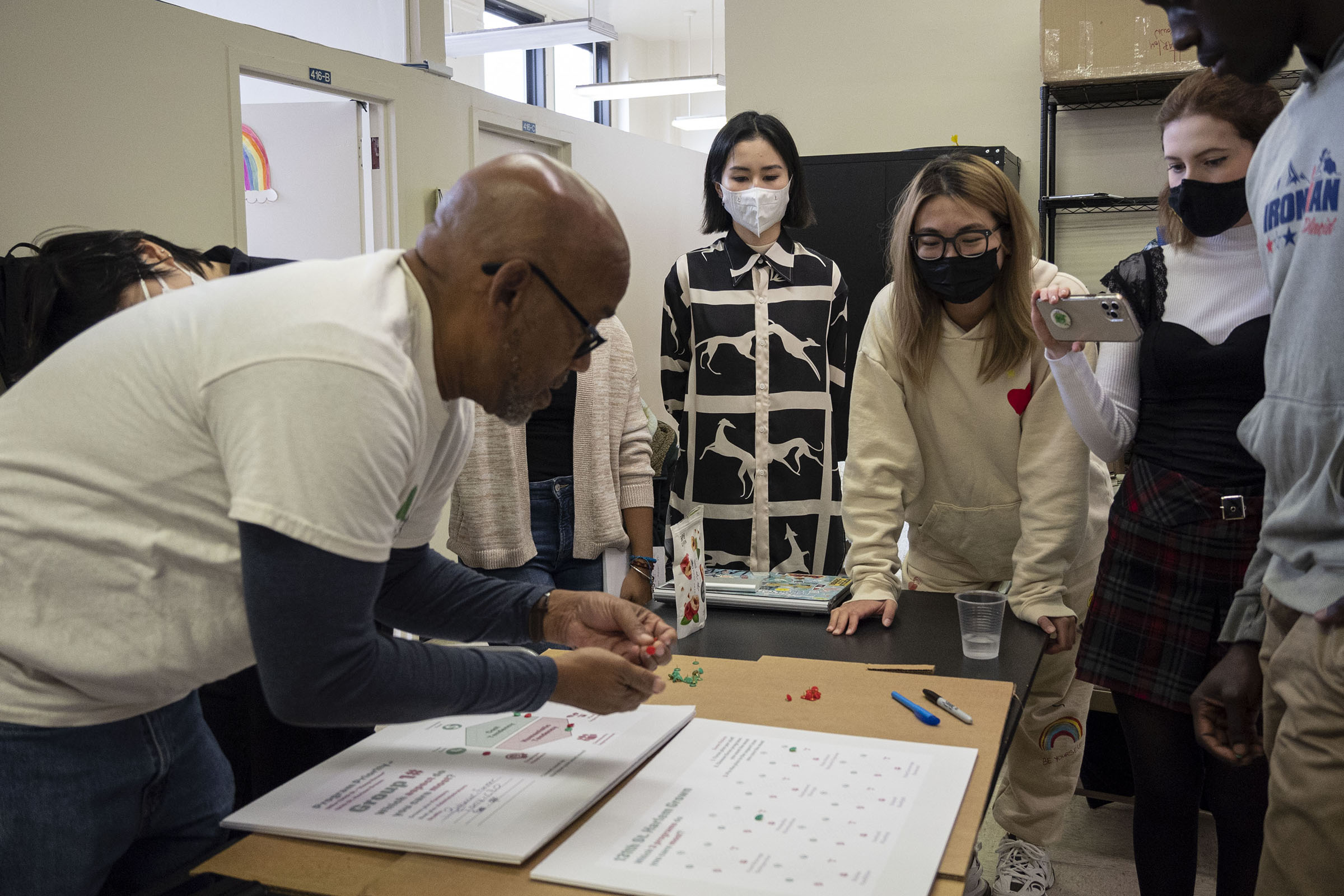 Harlem Grown founder and CEO, Tony Hillery, with Pratt students Ningduan Yang, Qilin Yu, Jessica Kraemer during a workshop (photo by Charles Newman)