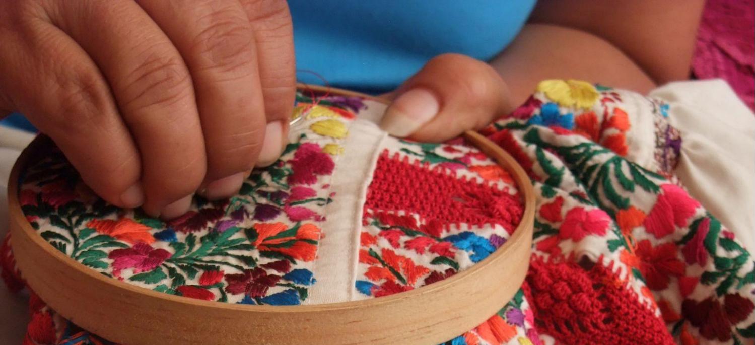 woman weaving fabric
