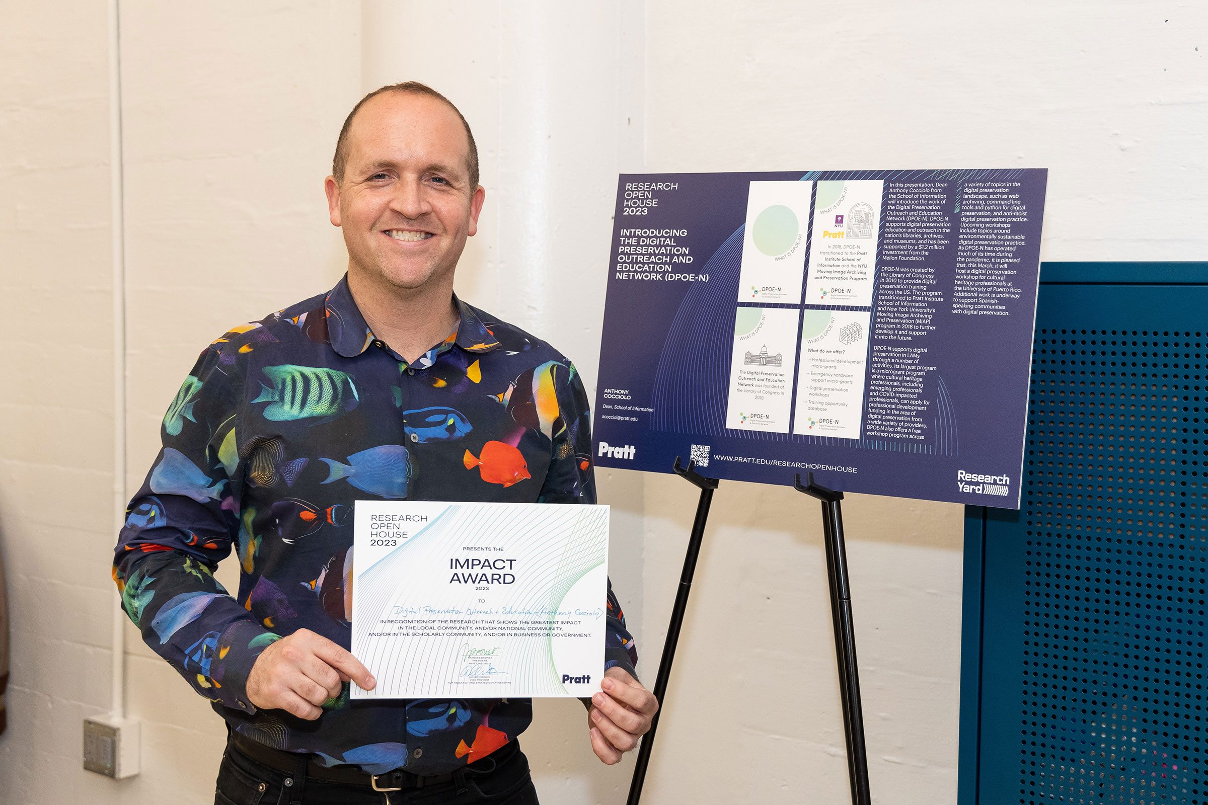 Anthony Cocciolo, dean of the School of Information, with the Impact Award for the Digital Preservation Outreach and Education Network (DPOE-N) (photo by Sam Stuart)