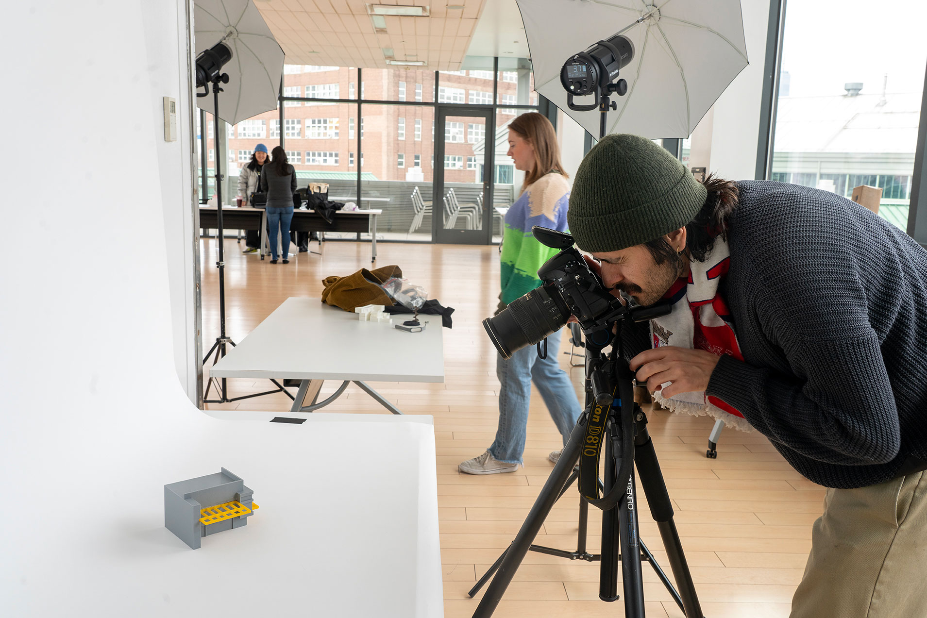 Mateo Arciniegas Huertas, BFA Photography ’23, in the Made in NYC Product Photography Studio (courtesy Stephanie Powell for Made in NYC)