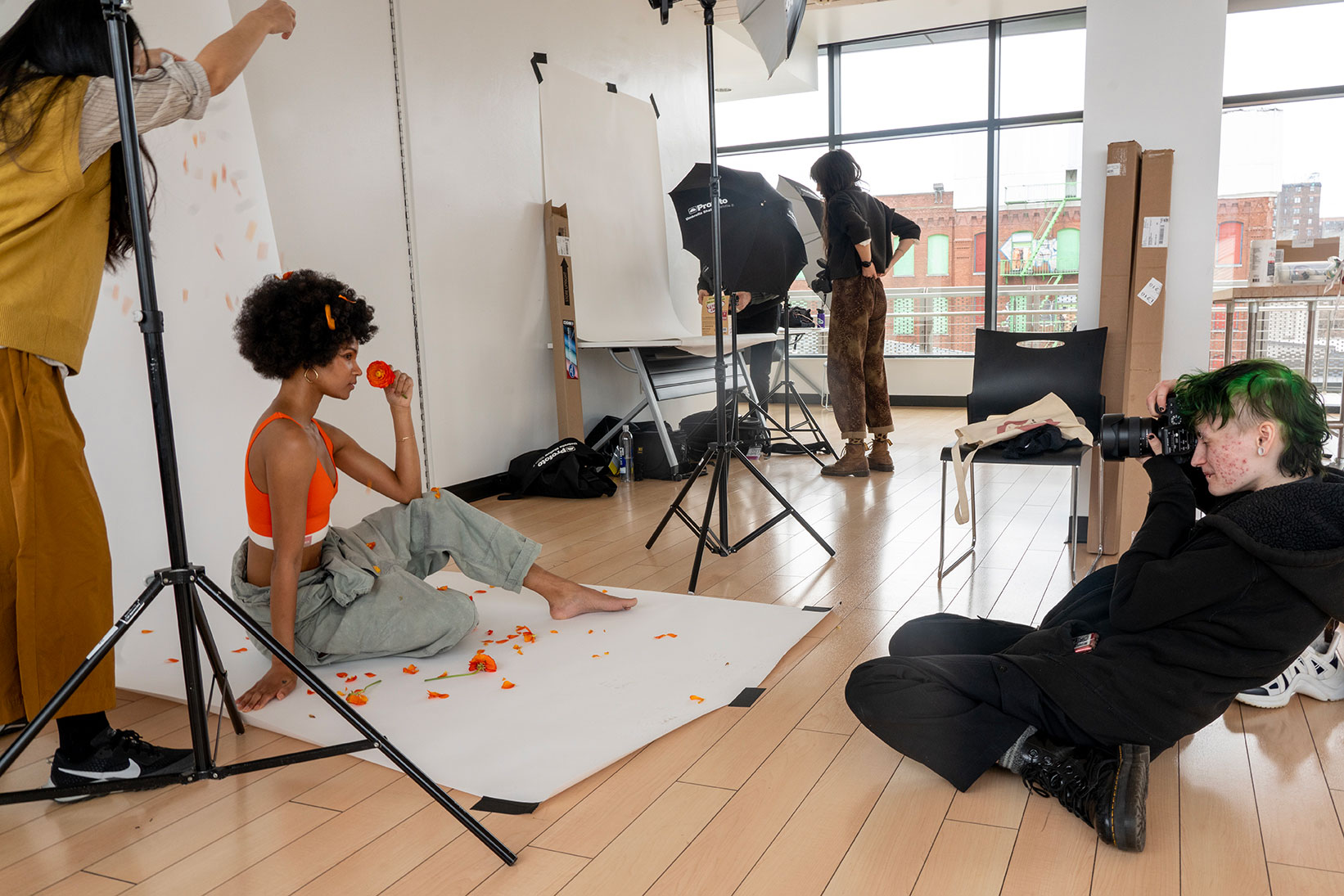 Bug Adams, BFA Photography ’23, in the Made in NYC Product Photography Studio (courtesy Stephanie Powell for Made in NYC)