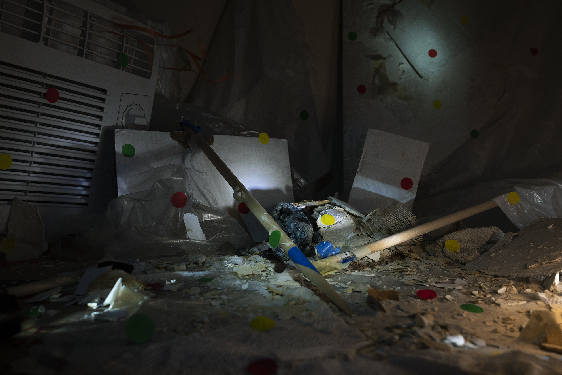 A photograph of water-damaged objects in a room.