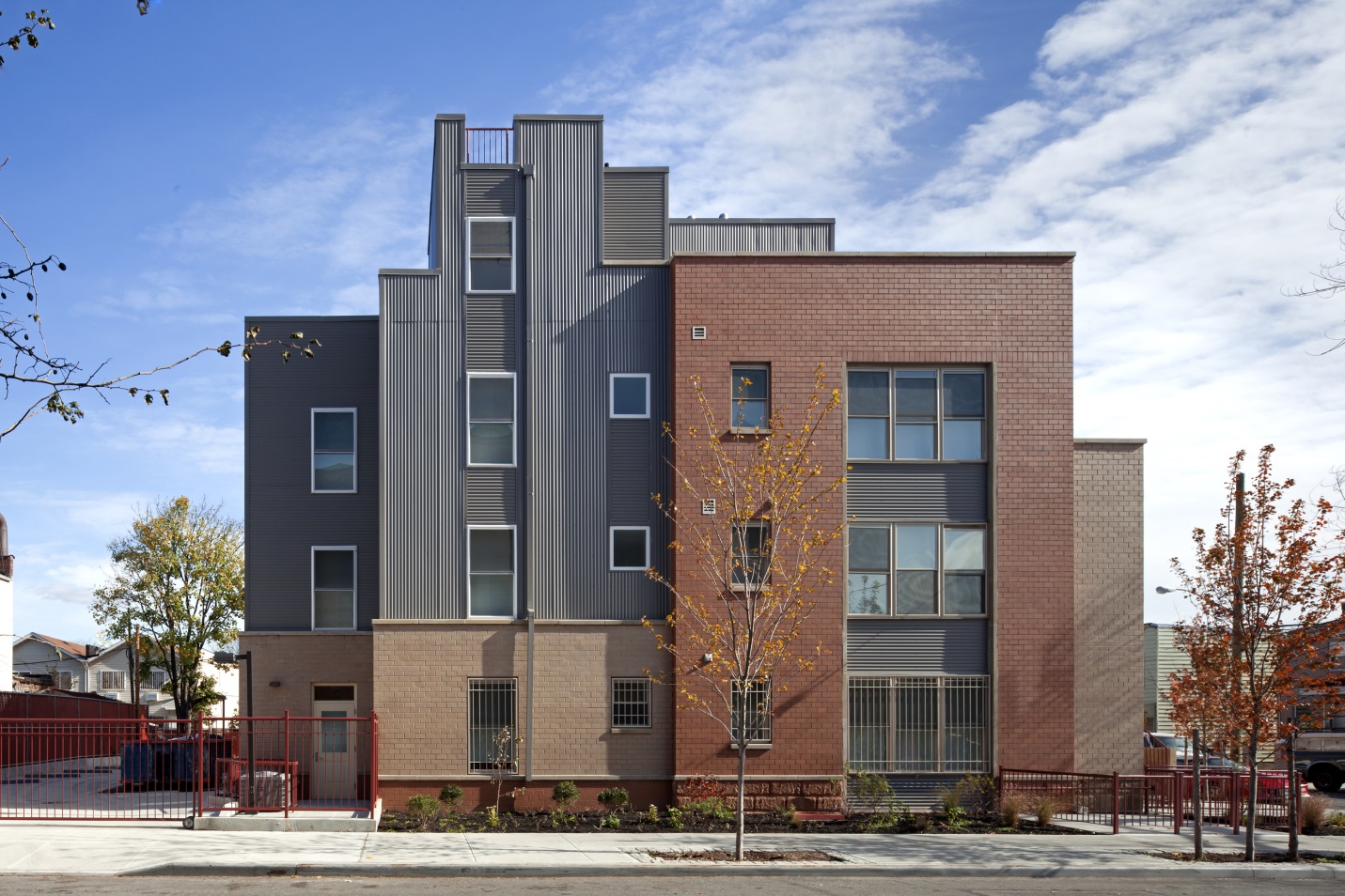 building in cypress hills, with modern architecture, looks to be bulid around world war two