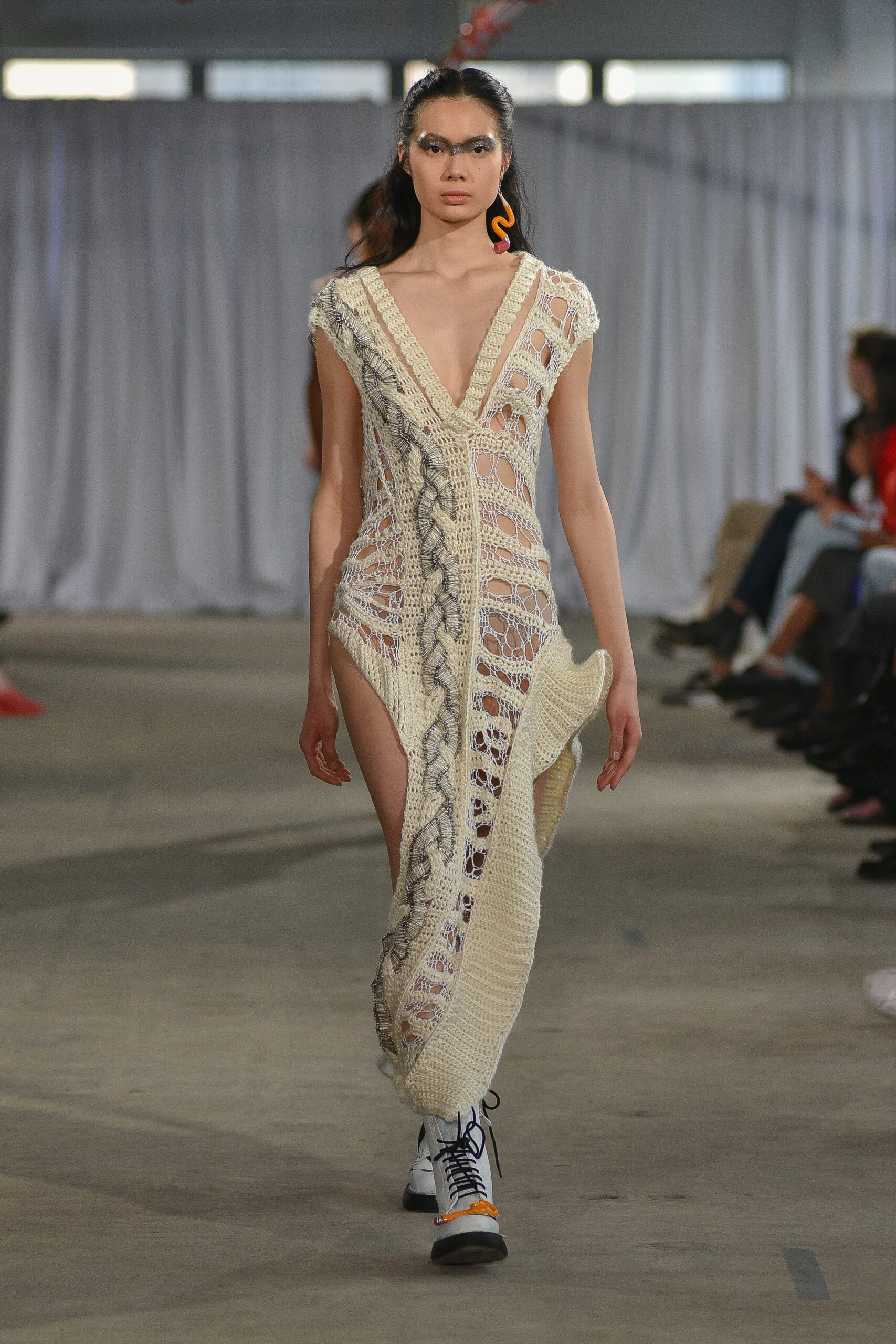 Model in knit dress by designer Dan Li.