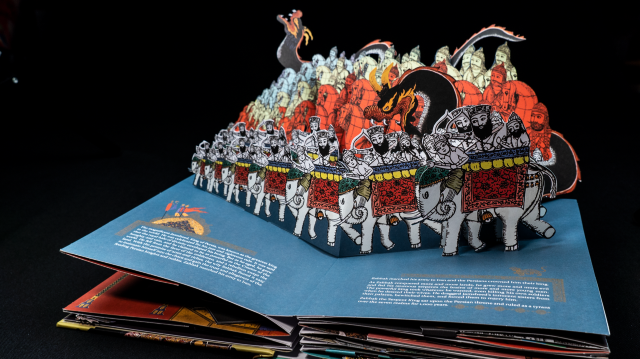 A popup book illustration of a battalion going into battle.