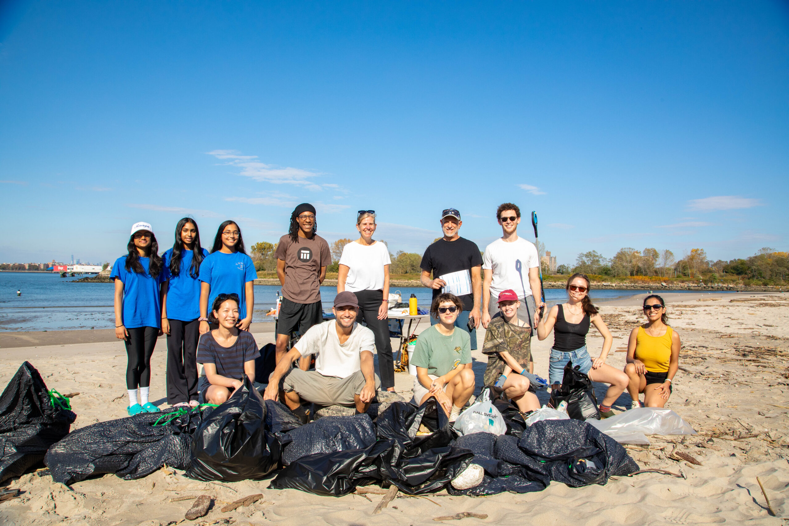 Group photo of the volunteers who helped clean-up Coney Island's Park Creek Beach for Pratt Earth Action Week.