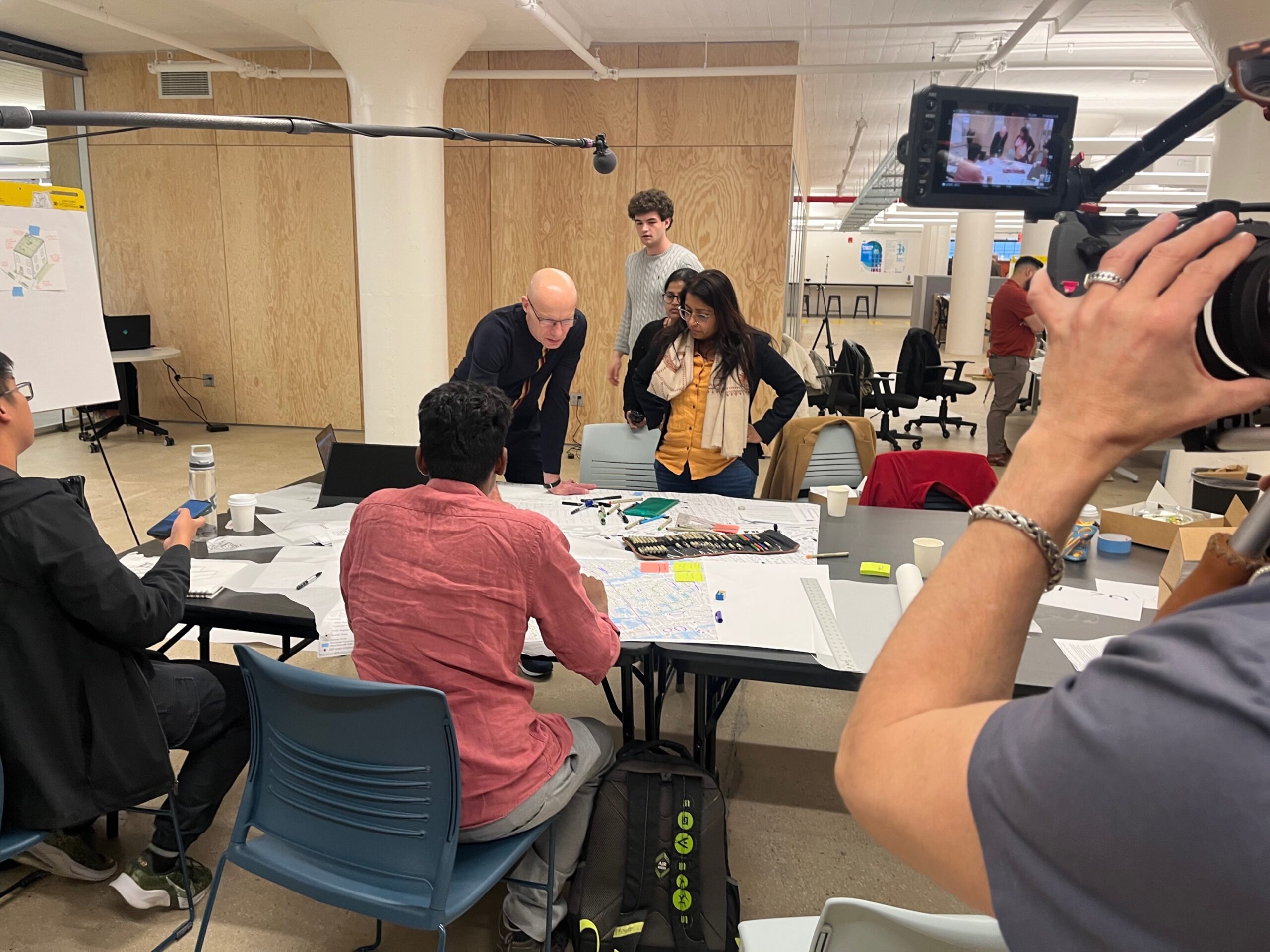 Henk Ovink working with Priyamwada Singh and students on an urban absorbency strategy for the Hollis neighborhood in Queens, NYC during a design workshop.