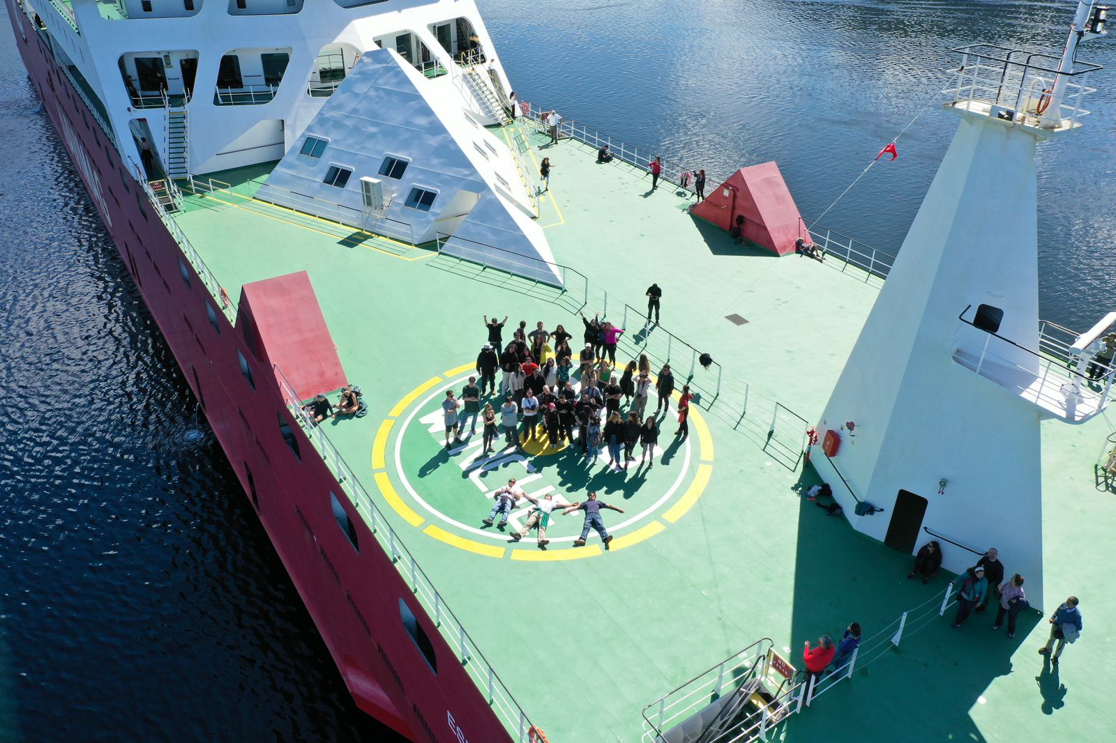 Founding Director David Erdman with students and faculty from Universidad del Desarrollo navigating the Patagonian Archipelago during a workshop.