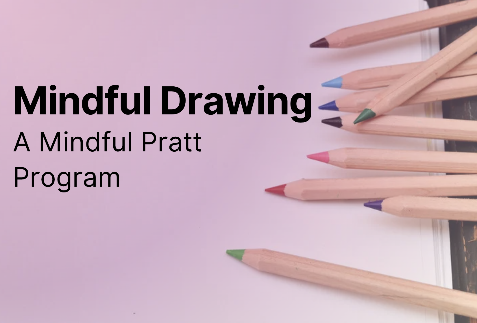 Backdrop of a plain, white notepad with wooden colored pencils laid out on it.
