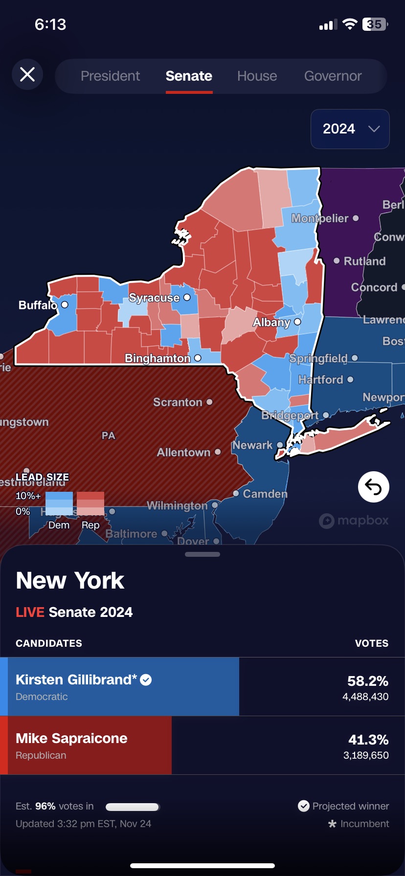 A map of New York state, colored red and blue, on a smart phone screen.