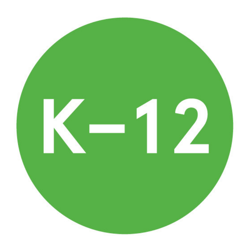 Green circular icon with white text in the center that reads “K–12,” indicating a focus on kindergarten through 12th grade education. This image is often used to visually represent school-age educational content or audiences.
