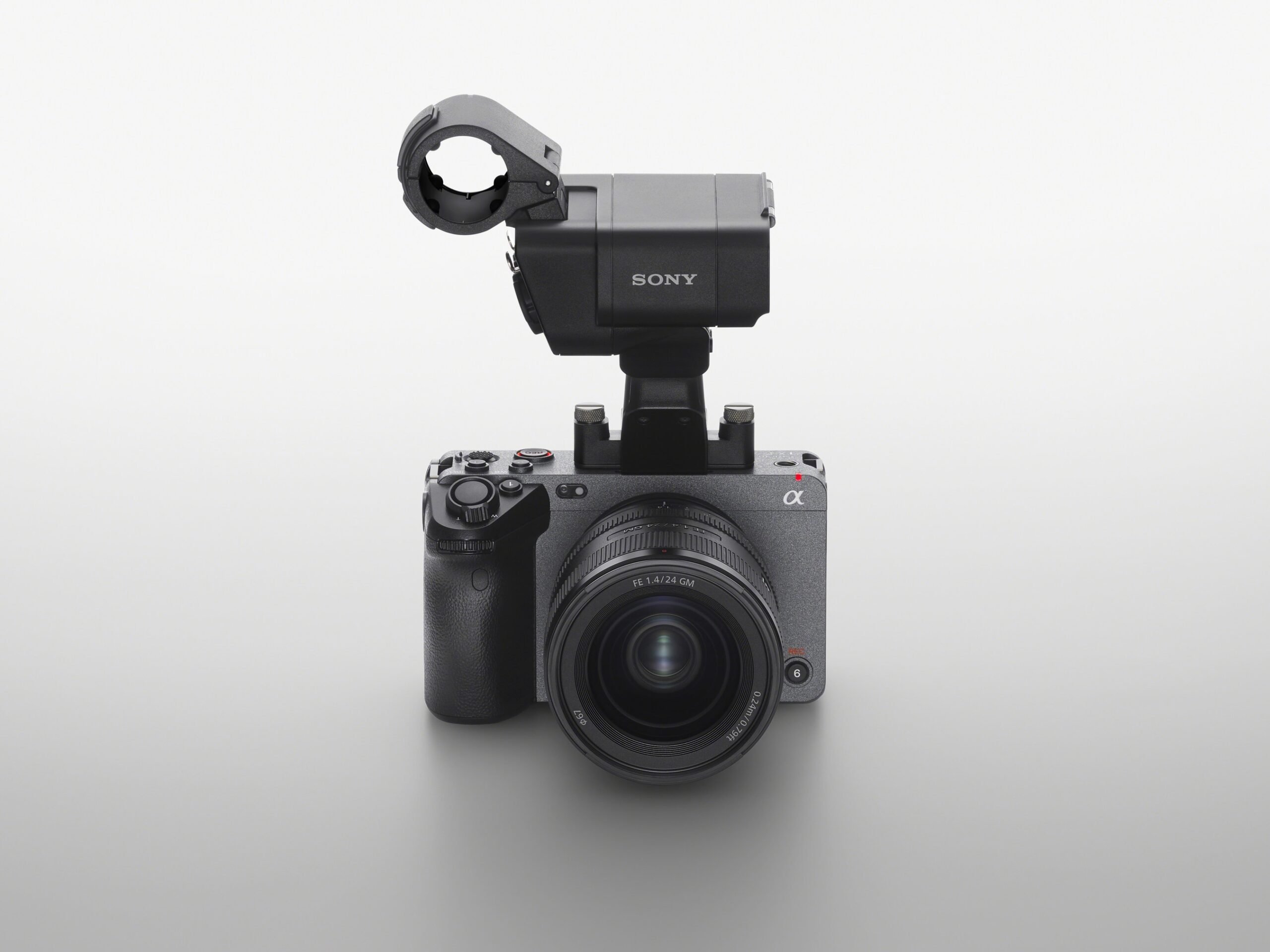 Product shot against a white background of a Sony digital camera with an external attachment on the top of the camera body