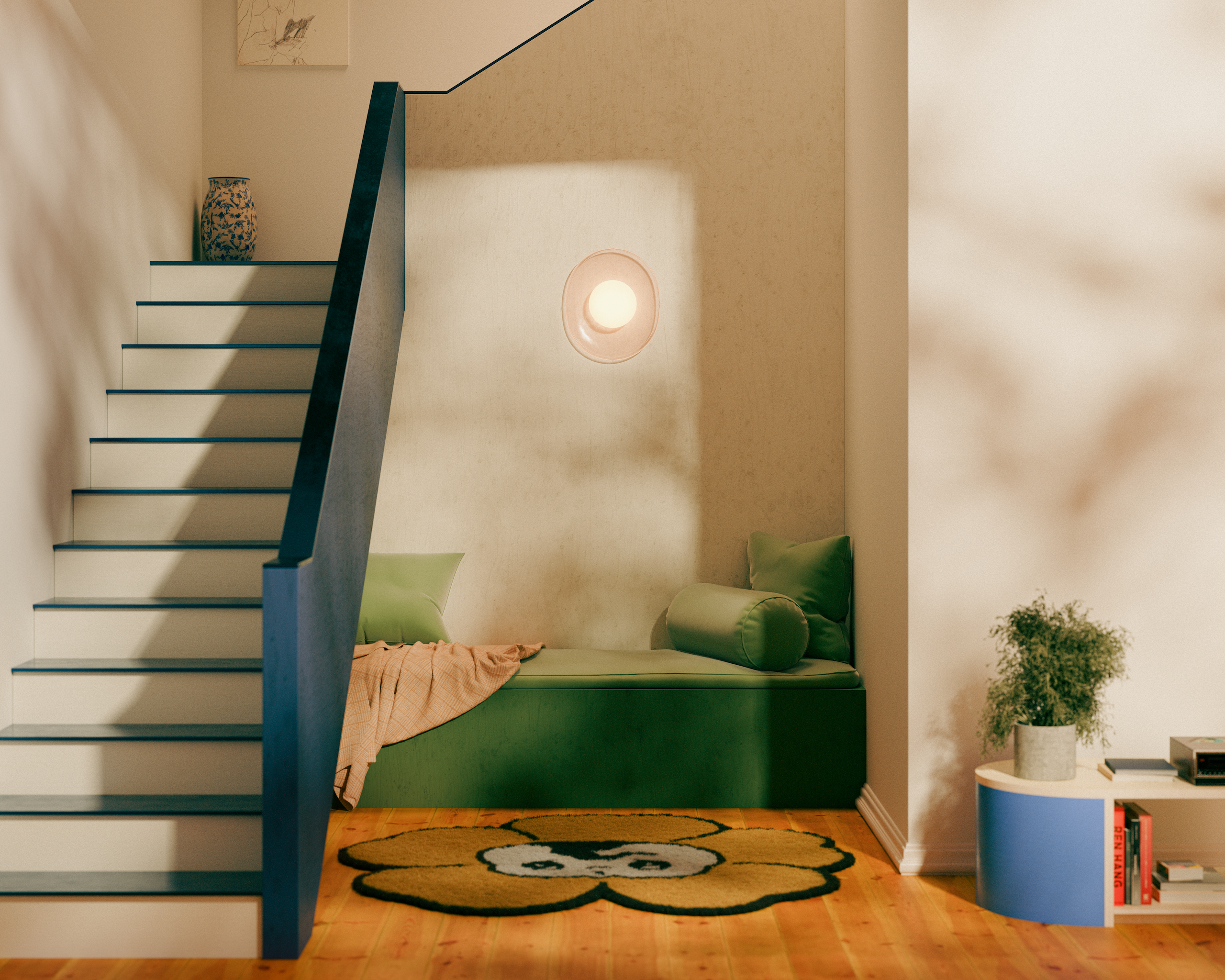 Interior space with a light pink, oval sconce with a circular bulb centered in the middle of the set