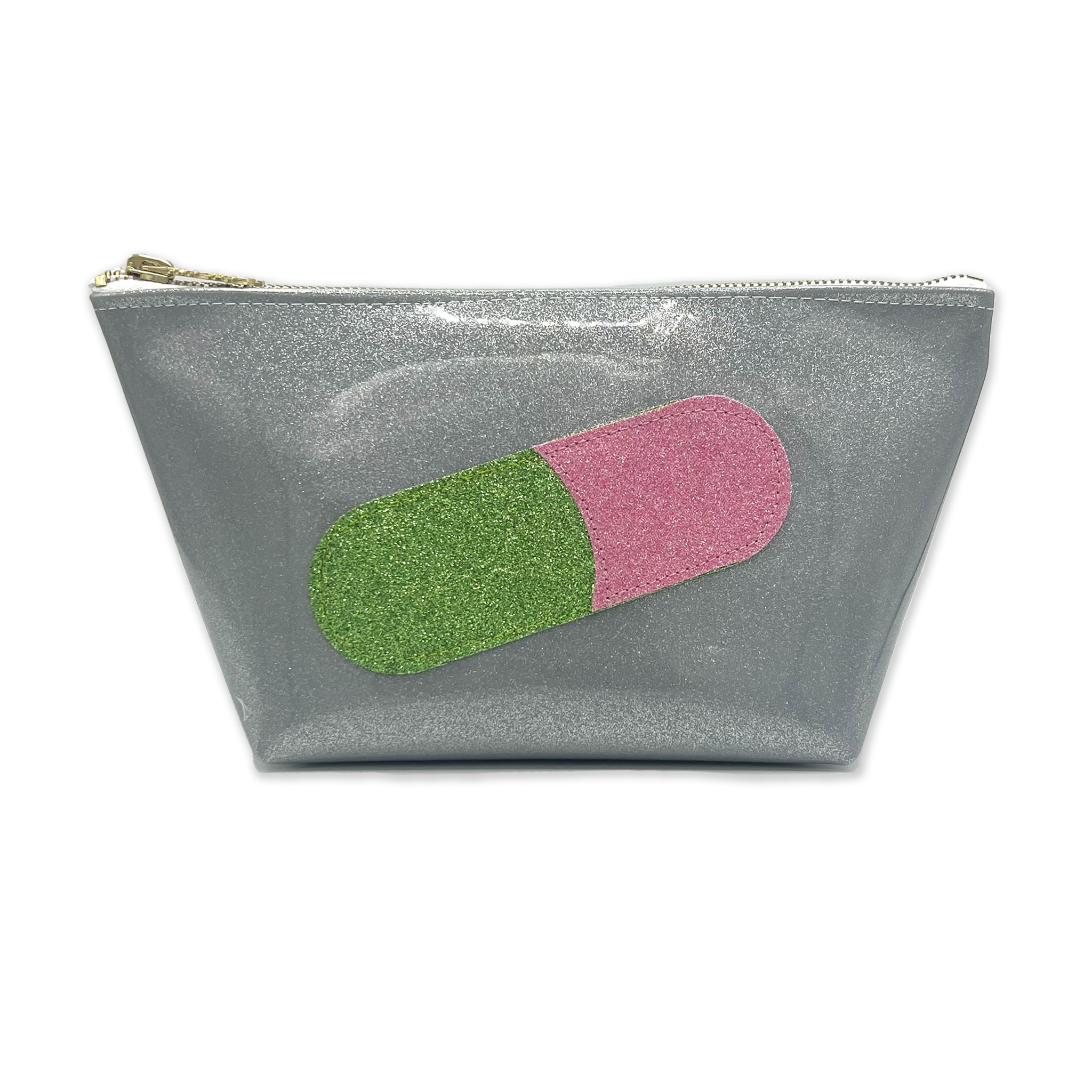 Silver glittery trapezoid-shaped clutch with a half-toned pink and green pill decal in the center