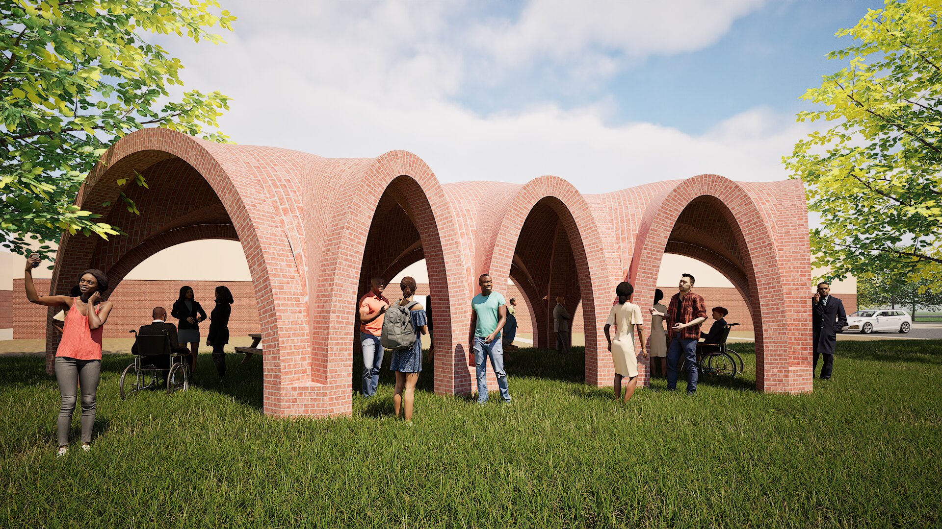 Digital rendering of a brick vault pavilion structure in an outdoor grassy area. The open-air space is filled with people of diverse ages and abilities, including individuals in wheelchairs, under a series of intersecting arched brick forms, with trees and blue sky in the background.