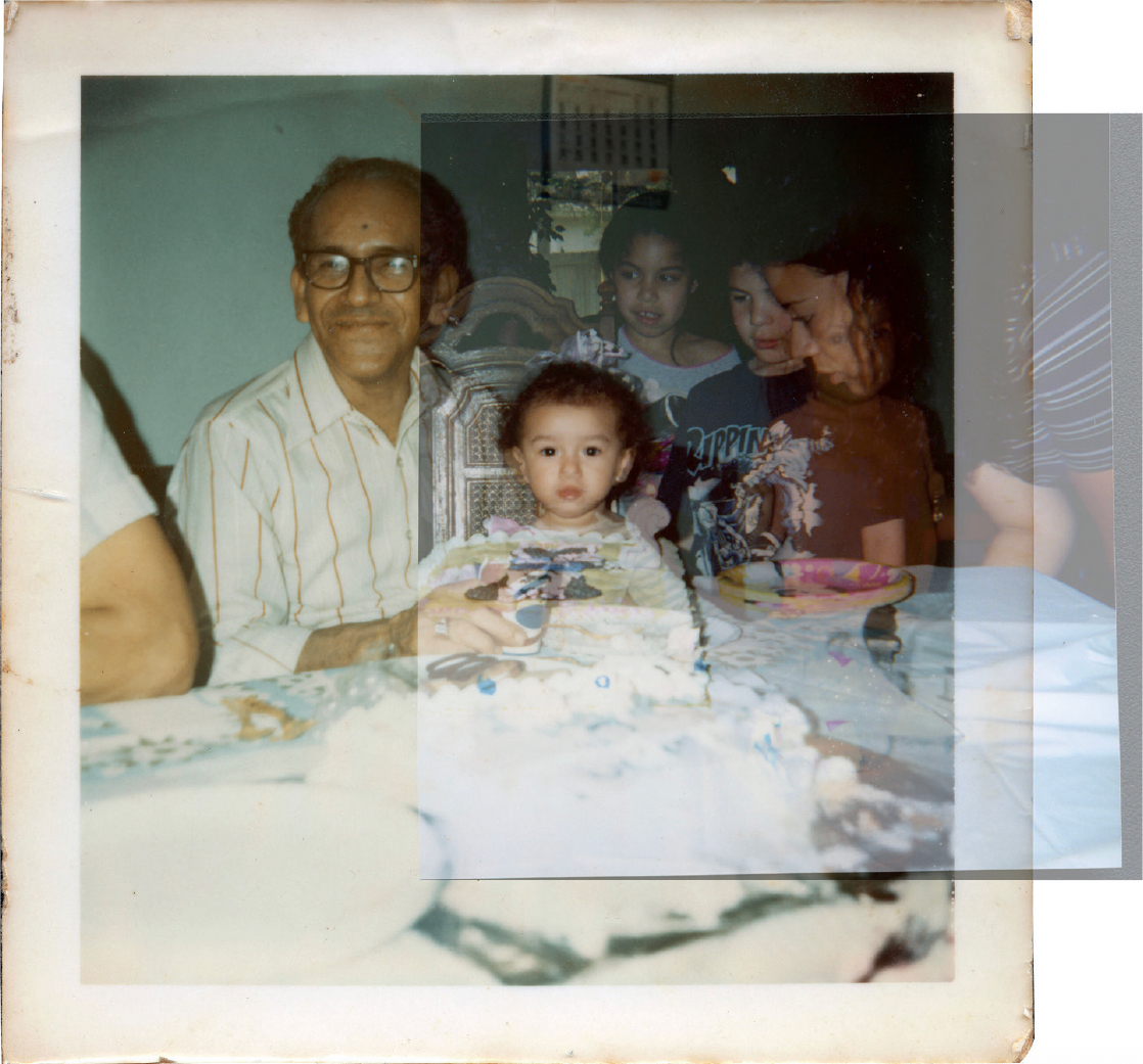 Multiple faded photographs are layered on top of each other. They are capturing a family gathering. An elderly man with glasses smiles and sits next to a child in a striped outfit, who is centered and appears to be admiring a cake with decorations. In the background, several children are visible, with one girl standing and others sitting, all engaging in the moment. The table is adorned with a tablecloth and cake. The image has a nostalgic feel, likely from a celebration.