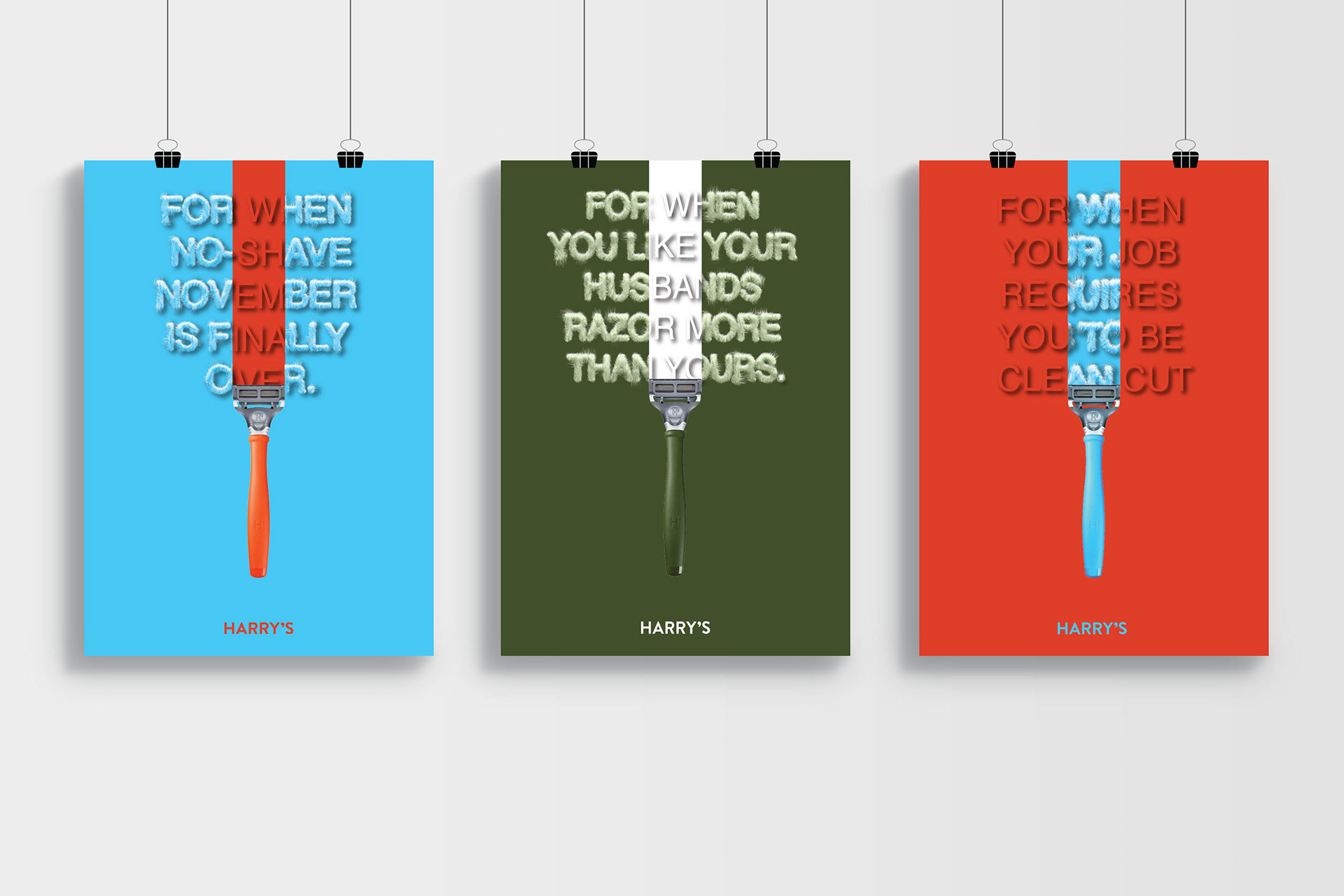 Advertising posters for Harry’s razors featuring three vertical panels with bold backgrounds. Each has a razor handle centered with text shaved into the panel: left panel on blue background says “For when No-Shave November is finally over,” middle green panel says “For when you like your husband’s razor more than yours,” right red panel says “For when your job requires you to be clean cut.”