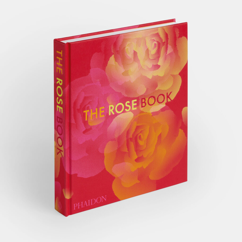 Cover of The Rose Book. A hardcover book with a red cover adorned with overlapping, semi-translucent gold and fuchsia pink roses. 