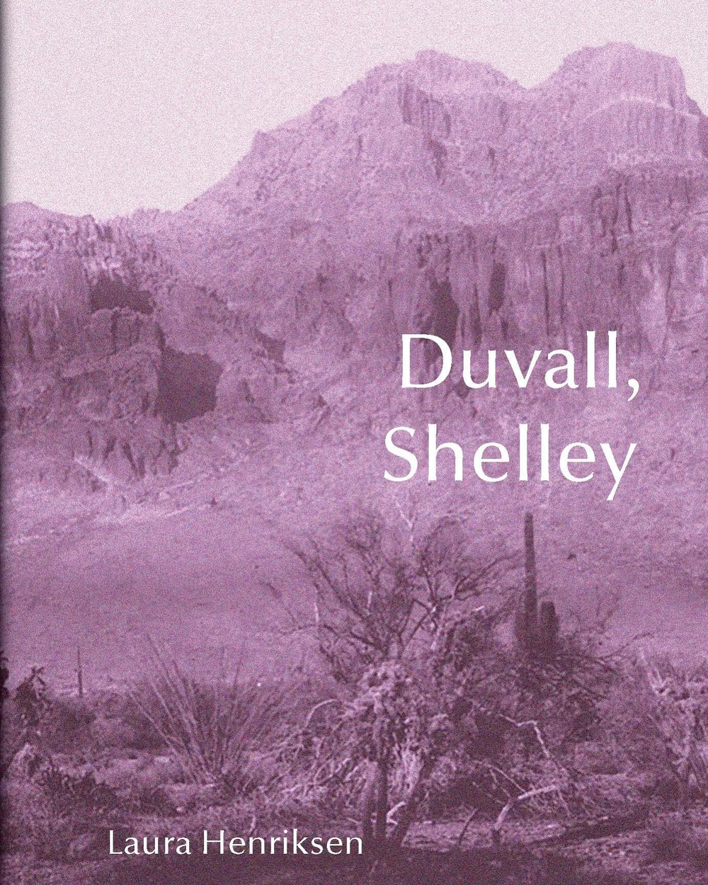 The cover of “Duvall, Shelley” depicts a mountainous desert landscape in purple hues.
