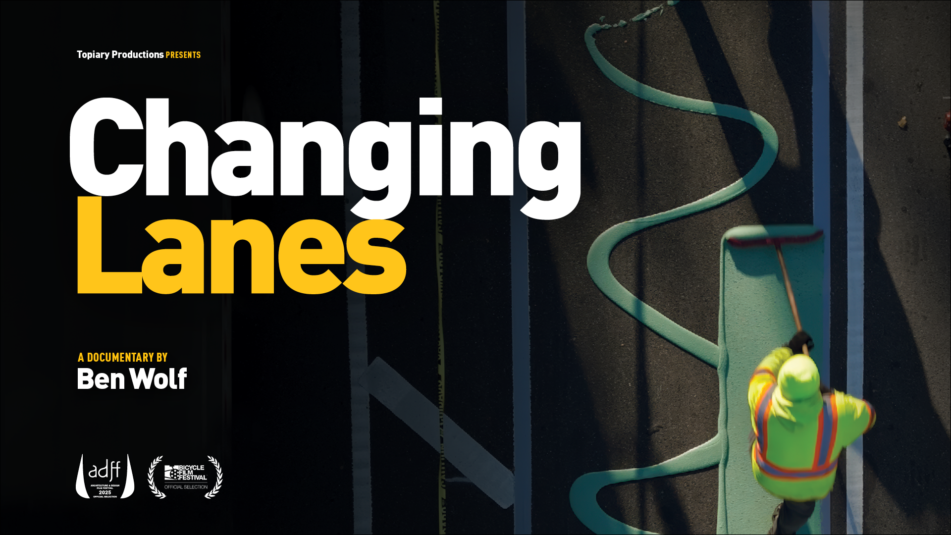 Vertical documentary film poster showing an overhead view of a roadway where a worker in a high-visibility jacket and helmet paints a winding teal bike lane line using a roller. Large bold text reads “Changing Lanes,” with smaller text stating “A Documentary by Ben Wolf.” Additional credits appear along the right side, and logos at the bottom indicate official selections for design and bicycle film festivals. The composition emphasizes urban infrastructure, movement, and street redesign.