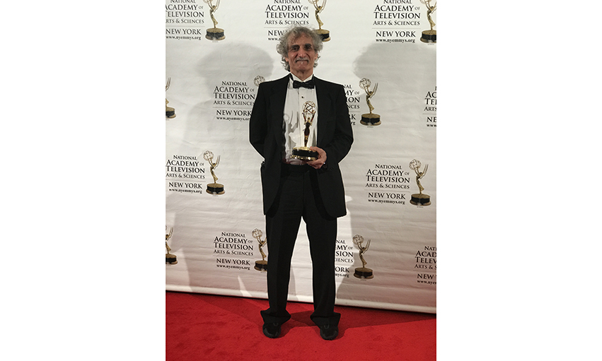 Steven Doloff, professor and acting chair of Dept of Humanities and Media Studies within Pratt Institute's School of Liberal Arts and Sciences, with his 2017 Emmy for Theater Talk