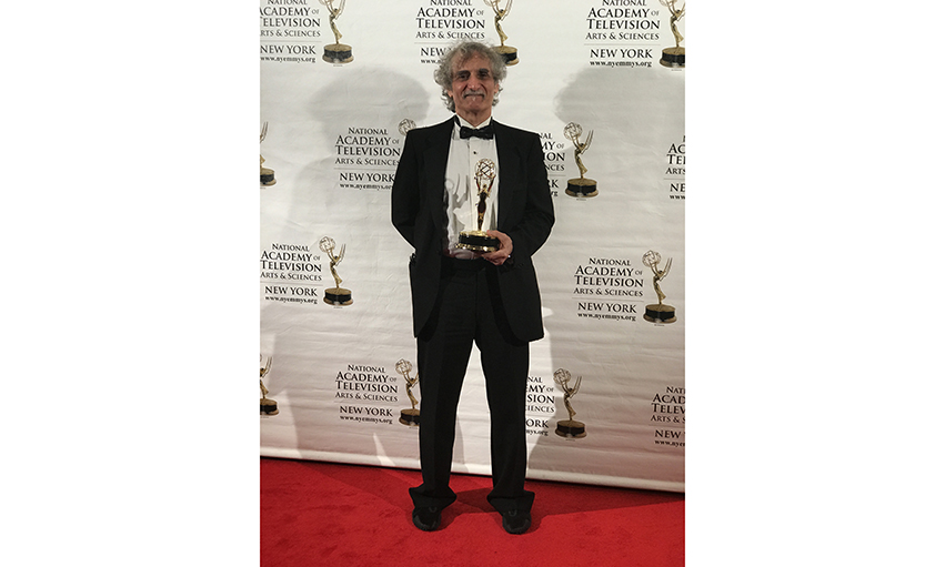 Steven Doloff, professor and acting chair of Dept of Humanities and Media Studies within Pratt Institute's School of Liberal Arts and Sciences, with his 2017 Emmy for Theater Talk