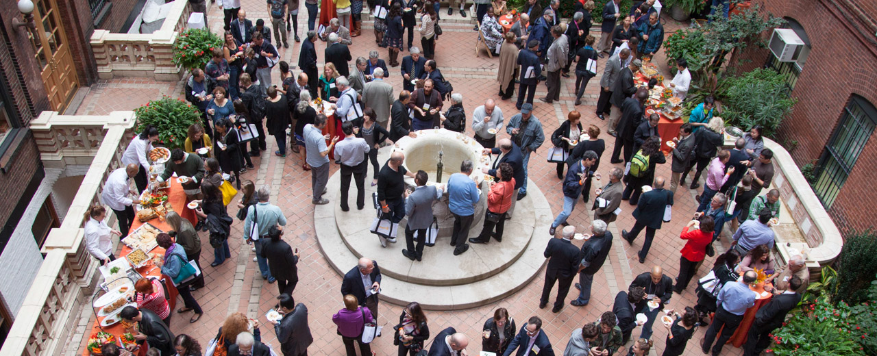 Aerial shot of alumni around fountain