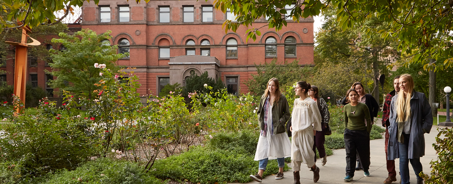 Pratt students near campus building