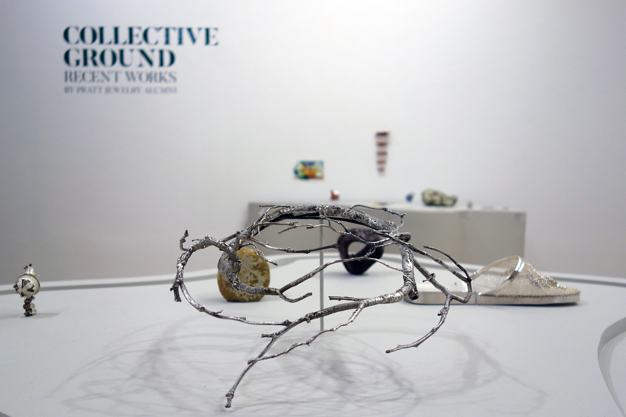 Installation view of Collective Ground at Steuben Gallery, with work by Carrie Bilbo at center